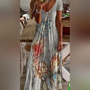 BUTTERFLY DRESS WITH SHORT SLEEVES.